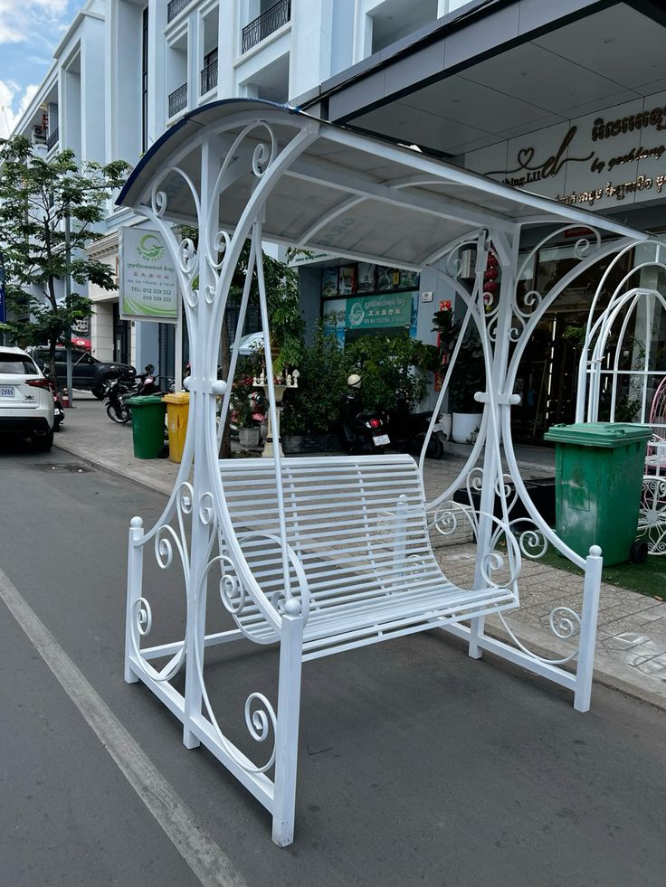 White Ornate Covered Garden Swing